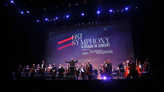 Philippine Philharmonic Orchestra performs in the Metropolitan Theater in Manila on June 29. [KOREAN CULTURAL CENTER]