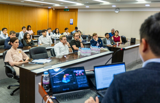 Students from the University of Cambridge's MBA program listen to presentations during their visit to SK Telecom's headquarters in Jung District, central Seoul [SK TELECOM] 