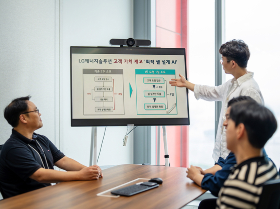 LG Energy Solution employees discuss the development of a new AI-powered system that could drastically reduce the battery cell design process to a day. [LG ENERGY SOLUTION]
