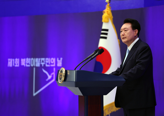 President Yoon Suk Yeol speaks during a ceremony for the inaugural North Korean Defectors' Day at the Blue House compound in central Seoul Sunday. [JOINT PRESS CORPS]