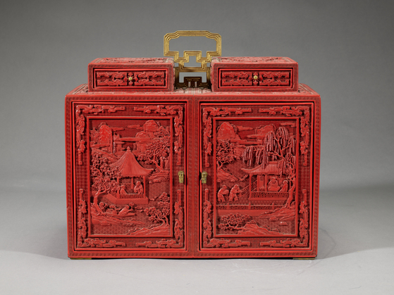A Chinese container with landscape and figure design made with carved lacquer from circa 1735 to 1796 [NATIONAL MUSEUM OF CHINA]