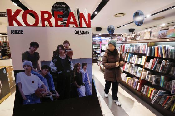 People look around a record store in downtown Seoul on Dec. 19, 2023. [YONHAP]