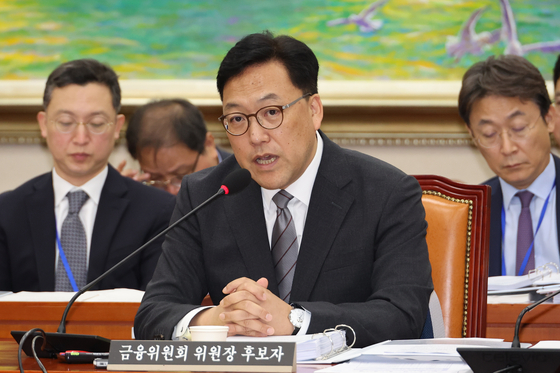 Kim Byoung-hwan, the nominee to head the Financial Services Commission, speaks at a parliamentary confirmation hearing held at the National Assembly on Monday. [YONHAP]