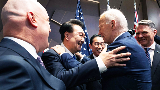 President Yoon Suk Yeol embraces U.S. President Joe Biden at the Korea-Japan-Australia-New Zealand (IP4) summit during the NATO summit in Washington, D.C. on July 11. [PRESIDENTIAL OFFICE]