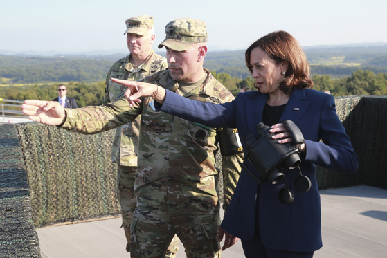 U.S. Vice President Kamala Harris, right, stands at a military observation post as she visits the demilitarized zone separating the two Koreas, in Panmunjeom in South Korea on Sept. 29, 2022. [JOINT PRESS CORPS]