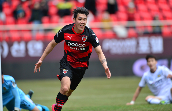 Then-Pohang Steelers forward Song Min-kyu celebrates scoring a goal during a K League 1 match against Incheon United at Pohang Steelyard in Pohang, North Gyeongsang on Feb. 28, 2021. [NEWS1] 