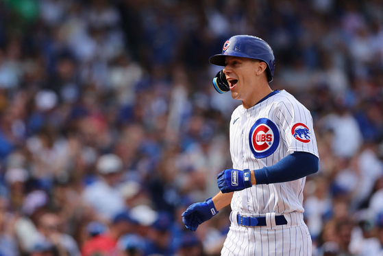 Jared Young celebrates after hitting a two-run home run for the Chicago Cubs at Wrigley Field in Chicago on Sept. 22, 2023.  [AFP/YONHAP]