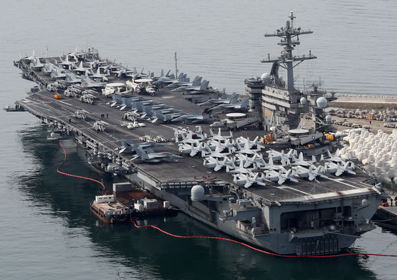 The nuclear-powered aircraft carrier USS Theodore Roosevelt (CVN 71) is docked at the naval base in Nam District, Busan, on June 26. [NEWS1]