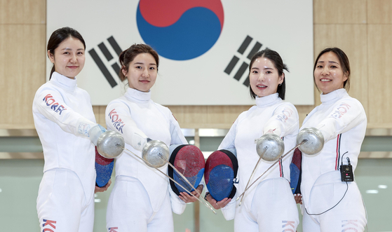 The Korean women's epee team of, from left, Choi In-jeong, Lee Hye-in, Song Se-ra and Kang Young-mi pose for a photo at the Jincheon National Training Center in Jincheon, North Chungcheong on May 27.  [JOONGANG ILBO]