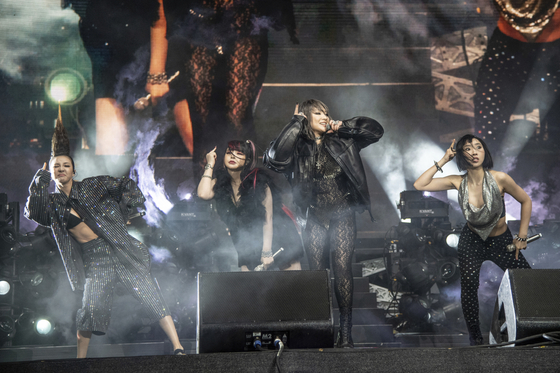 2NE1 performs at the Coachella Music and Arts Festival at the Empire Polo Club on April 16, 2022. [AP/YONHAP]