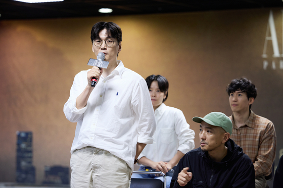 Translator Hwang Seok-hee speaks to the press during a press conference for "Angels in America" at Sungshin Women's University Mia Unjeong Green Campus on Wednesday. [LABAMINE]