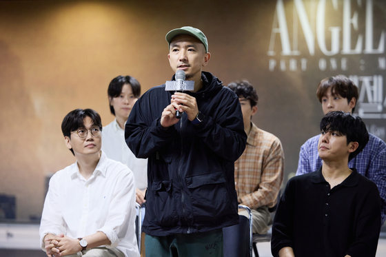 Director Shin Yoo-cheol speaks to the press during a press conference for "Angels In America" at Sungshin Women's University Mia Unjeong Green Campus on Wednesday. [LABAMINE]
