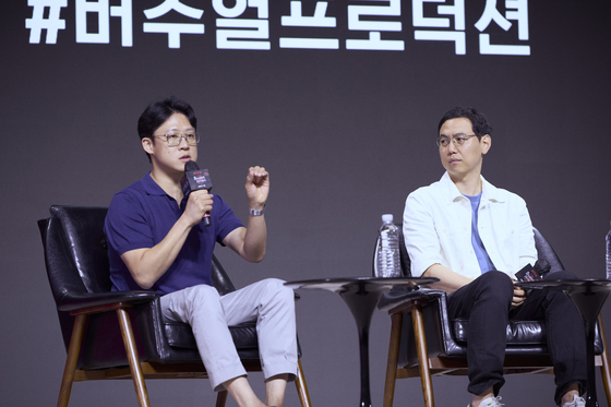 From left, Ha Jung-su, Netflix Korea's Head of Production, speaks alongside Lee Ke-O, Netflix Korea's Content Director, during a press conference in Dongdaemun District, eastern Seoul, on July 17. [NETFLIX]