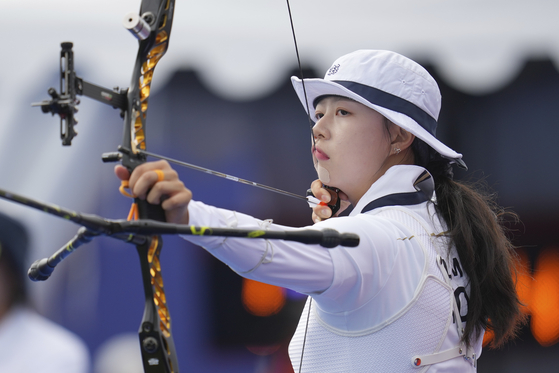 Korea's Lim Si-hyeon competes during the women's archery individual ranking round at the 2024 Paris Olympics in Paris on Thursday.  [AP/YONHAP]