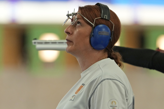 Georgia's Nino Salukvadzegestures during the 10m air pistol women's qualification round at the 2024 Paris Olympics in Chateauroux, France on Saturday.  [AP/YONHAP]