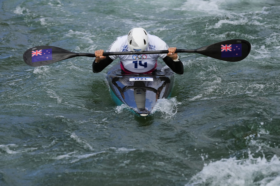 Luuka Jones of New Zealand reacts at the end of the women's kayak single finals during the canoe slalom at the Paris Olympics on Sunday in Vaires-sur-Marne, France. [AP/YONHAP]