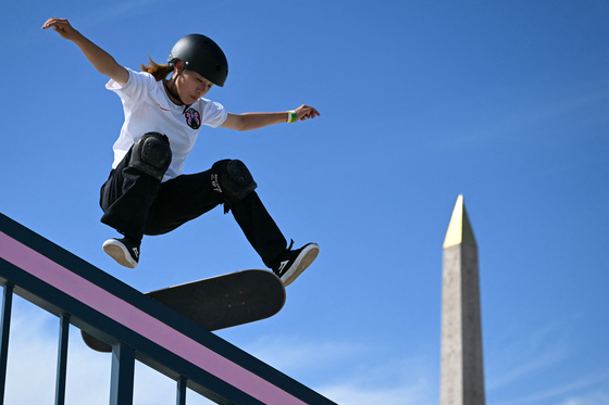 Japan's Coco Yoshizawa competes in the women's street skateboarding final at La Concorde in Paris on Sunday.  [AFP/YONHAP]