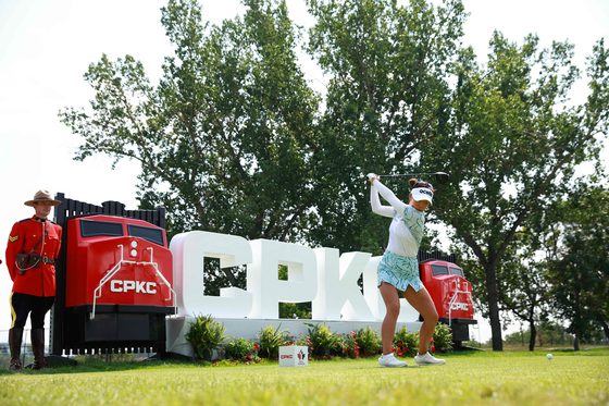 Korea's Jenny Shin plays her shot from the first tee during the final round of the CPKC Women's Open at Earl Grey Golf Club on Sunday in Calgary, Alberta. [AFP/YONHAP]