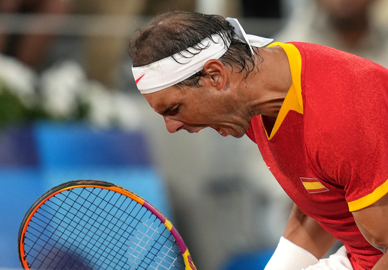 Rafael Nadal of Spain reacts at the Stade Roland-Garros in Paris, France on Saturday. [XINHUA/YONHAP]