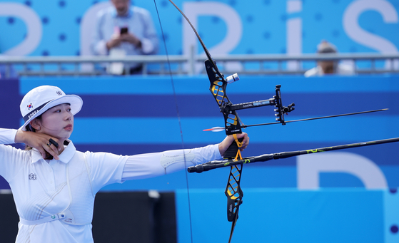 Korea's Lim Si-hyeon competes during the women's team archery gold medal match against China at the Invalides in Paris on Sunday.  [EPA/YONHAP]