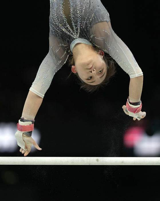 Shin Sol-yi of Korea competes on the uneven bars during a women's artistic gymnastics qualification round at Bercy Arena in Paris on Sunday. [AP/YONHAP]