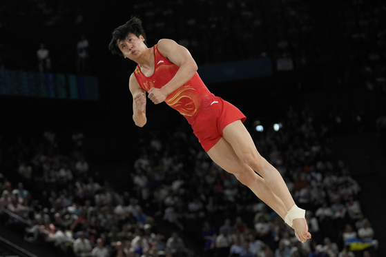 Sun Wei of China performs in the floor exercise during the men's artistic gymnastics team finals round at Bercy Arena at the Paris Olympics in Paris, France on Monday. [AP/YONHAP]