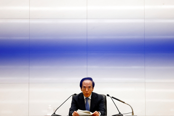 Bank of Japan Governor Kazuo Ueda speaks during a press conference after its policy meeting in Tokyo on Wednesday. [REUTERS/YONHAP]