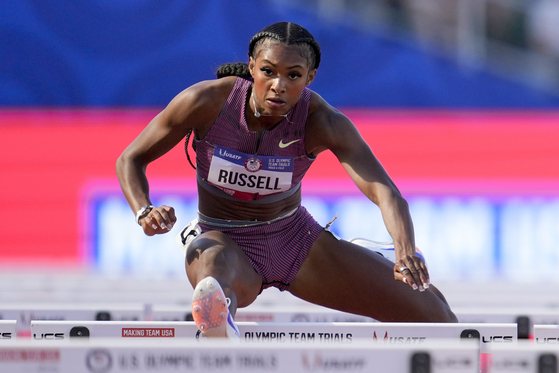 Masai Russell wins a heat women's 100-meter hurdles during the U.S. Track and Field Olympic Team Trials on June 28 in Eugene, Oregon. [AP/YONHAP]