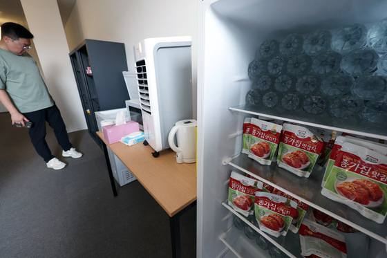 Where to find kimchi at the Paris Olympics. A refrigerator at the athletes’ lounge for Team Korea is filled with kimchi and bottled water at the Paris Olympic Village located in Saint-Denis, France, on July 23. [NEWS1]