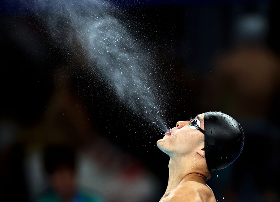 Ho Ian Yentou of Hong Kong reacts before a men's 100-meter freestyle heat of swimming in Paris on Tuesday. [XINHUA/YONHAP]