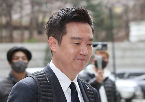 A former MBC reporter, Kim Se-eui who runs YouTube channel HoverLab, enters the Seoul Central District Court in southern Seoul in March last year to attend a trial after being indicted for spreading false information about former Justice Minister Cho Kuk's daughter. [NEWS1] 
