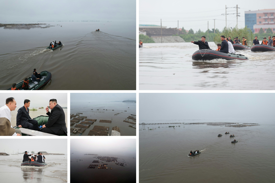 Photos carried by Pyongyang's state-controlled Korean Central News Agency on Wednesday show areas along the Yalu River submerged after torrential downpours last week. [NEWS1]