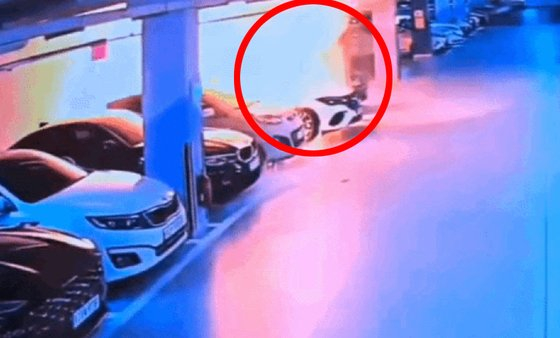 CCTV footage shows a Mercedes-Benz EV exploding at an underground parking lot in Incheon Thursday morning. [JOONGANG ILBO]