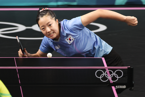 Shin Yu-bin of Korea competes during the women's singles quaterfinal match of table tennis against Miu Hirano of Japan at the Paris Olympics in Paris on Thursday. [XINHUA/YONHAP]