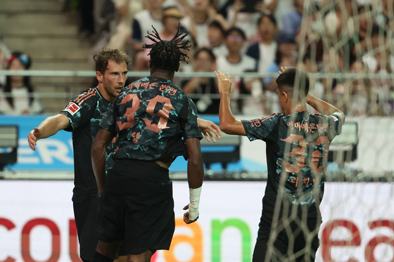 Bayern Munich's Leon Goretzka, left, celebrates scoring a goal during a Coupang Play Series match against Tottenham Hotspur at Seoul World Cup Stadium in western Seoul on Saturday. [NEWS1]