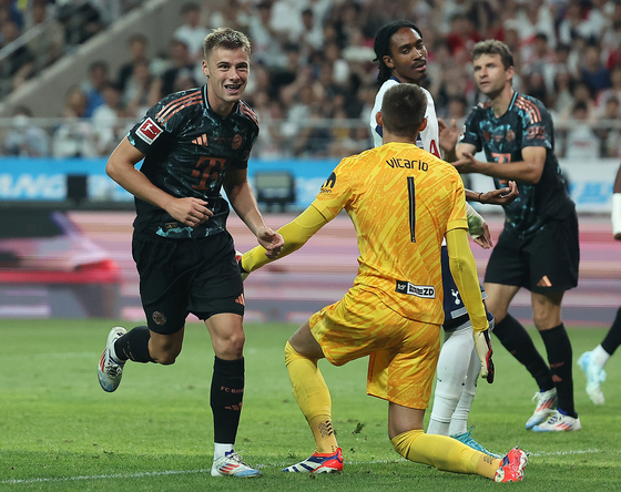 Bayern Munich's Gabriel Vidovic, left, celebrates scoring a goal during a Coupang Play Series match against Tottenham Hotspur at Seoul World Cup Stadium in western Seoul on Saturday. [NEWS1] 