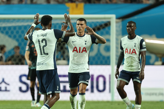 Tottenham Hotspur's Pedro Porro, center, celebrates scoring a goal during a Coupang Play Series match against Bayern Munich at Seoul World Cup Stadium in western Seoul on Saturday. [NEWS1]