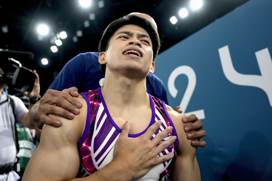 Carlos Yulo of the Philippines reacts after competing during the men's artistic gymnastics individual floor finals at Bercy Arena in Paris on Saturday. [AP/YONHAP]