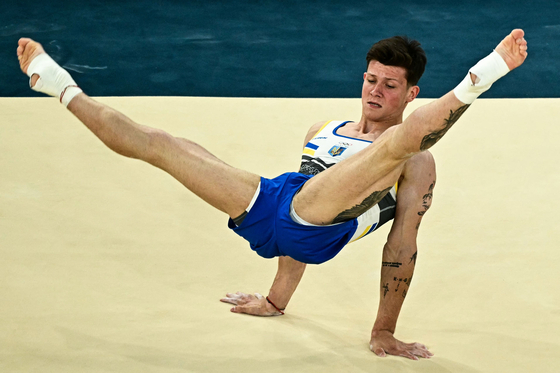 Ukraine's Illia Kovtun competes in the artistic gymnastics men's floor exercise final during the Paris Olympics at the Bercy Arena in Paris on Saturday. [AFP/YONHAP] 