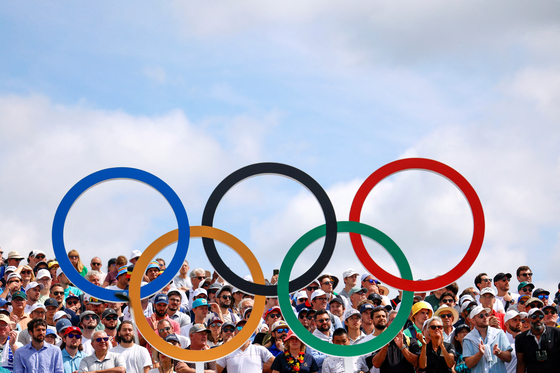 Fans in the stands during round four of the men's golf at Le Golf National, Guyancourt, France on Sunday.  [REUTERS/YONHAP]