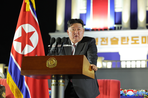 North Korean leader Kim Jong-un delivers a speech during a ceremony to transfer a new tactical ballistic missile weapon system to front-line units taking place in Pyongyang on Sunday, in this photo provided by the North's official Korean Central News Agency. [YONHAP]