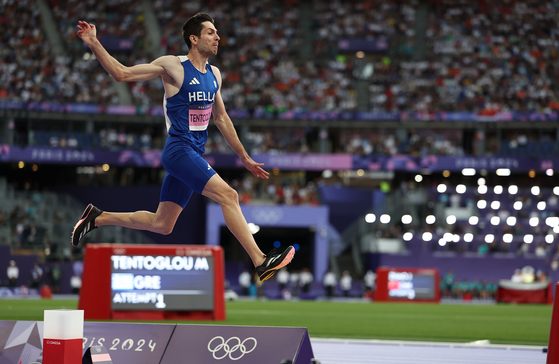 Miltiadis Tentoglou of Greece competes in the men's long jump in Paris on Tuesday. [XINHUA/YONHAP]