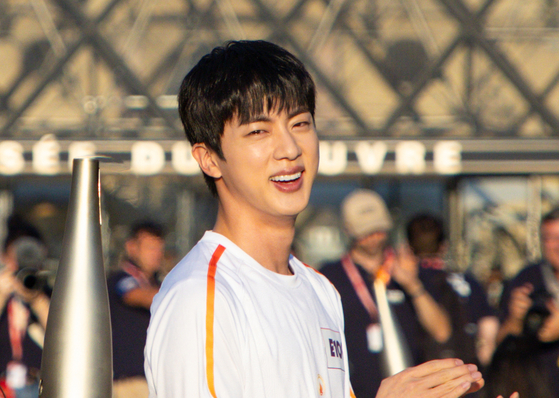 Jin of boy band BTS participating as an Olympic torchbearer on July 15 in Paris, France [NEWS1]