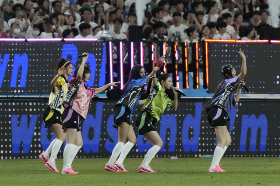 K-pop girl group NewJeans performs during halftime of the Coupang Play Series match between Tottenham Hotspur and Bayern Munich at Seoul World Cup Stadium in western Seoul on Aug. 3. [AP/YONHAP]