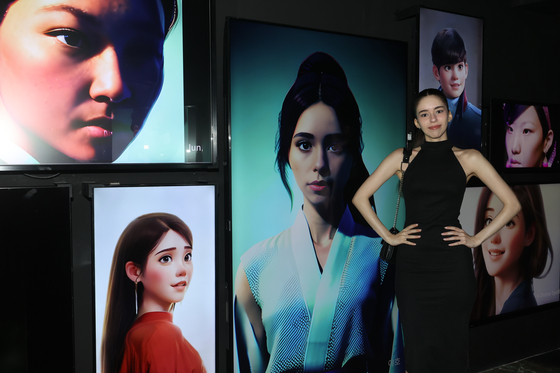 A visitor poses with an AI-generated photo at a Korean drama exhibition at Gallery Gwanghwa in Jongno District, central Seoul, on Monday. [YONHAP]