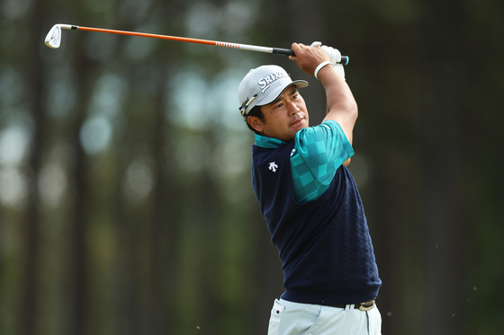 Hideki Matsuyama of Japan plays his second shot on the 16th hole during day two of the Genesis Scottish Open at The Renaissance Club on July 12 in North Berwick, Scotland. [GETTY IMAGES]