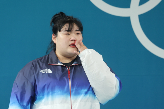 Korean weightlifter Park Hye-jeong reacts after winning a silver medal ...