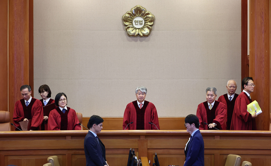 Constitutional Court justices attend a hearing at the court headquarters in Jongno District, central Seoul, on July 18. [YONHAP]