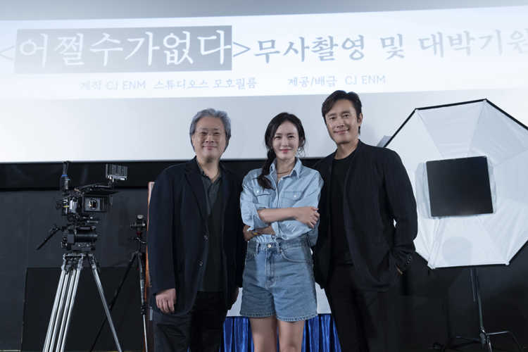 From left, Director Park Chan-wook, actors Son Ye-jin and Lee Byung-hun pose for a photo during an event for Park's latest film ″NO Other Choice″ (tentative title). [CJ ENM]