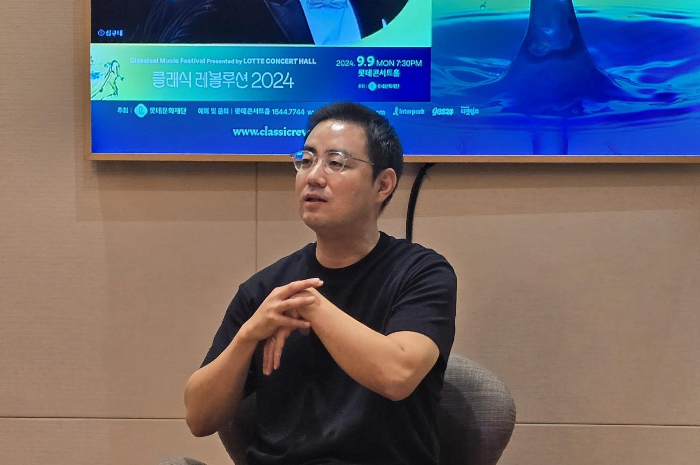 Conductor Choi Soo-yeoul speaks during a press interview for the upcoming Classic Revolution 2024 at the Lotte Concert Hall in southern Seoul on Monday. [YONHAP]